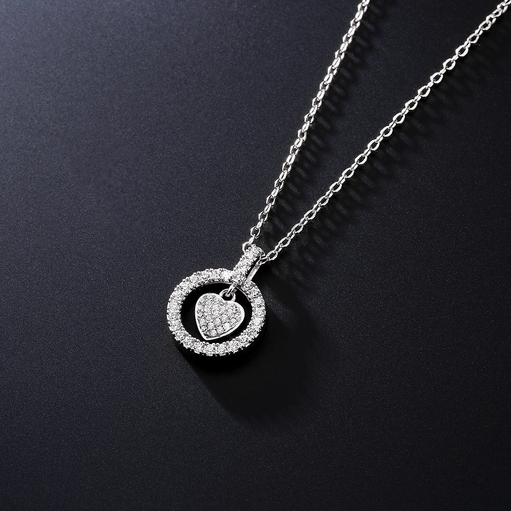 Colgante de corazón con circonitas y cadena